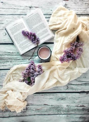 open book with lilacs and lavendar