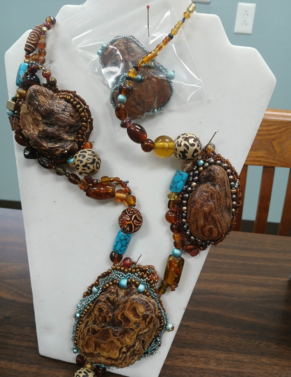 Beaded necklace with wooden pieces